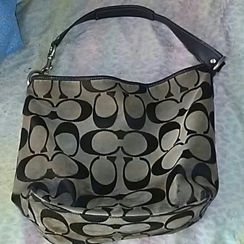 Coach purse in colors black and ivory